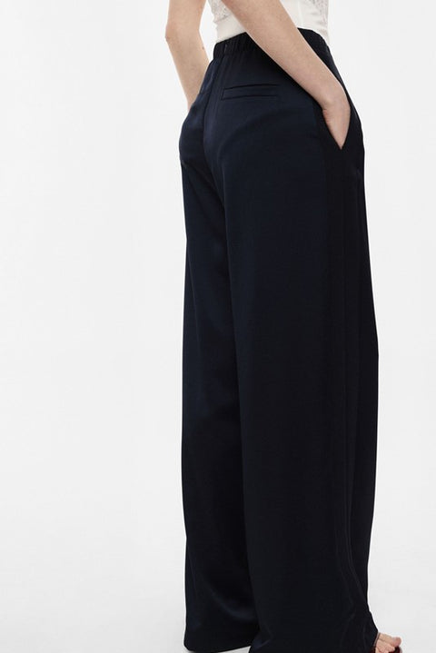Pantaloni palazzo a vita alta con linea ampia