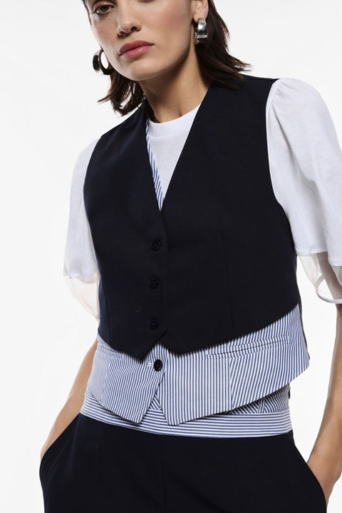 Gilet con chiusura a bottoni e orlo a righe