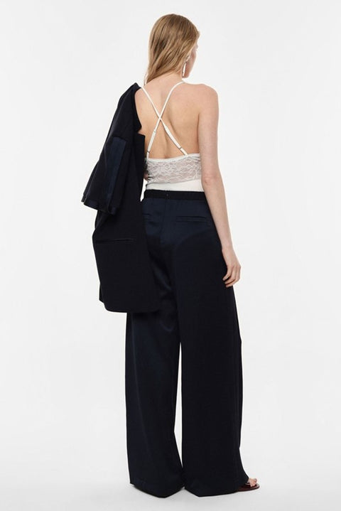 Pantaloni palazzo a vita alta con linea ampia
