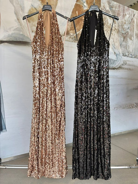 Abito lungo con paillettes e fiocco dietro