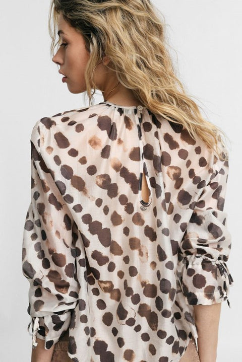 Blusa ampia stampa pois maniche lunghe con laccetti